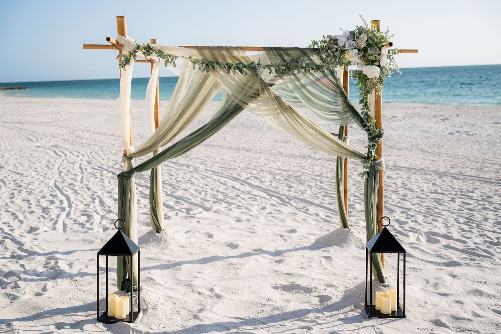 Florida beach wedding couple walking the shore at sunset, real photo from Florida Weddings ceremony